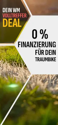 Werbung für 0% Finanzierung von Traumfahrrädern. Text: "Dein WM Volltreffer Deal", grüner Wiesenhintergrund.