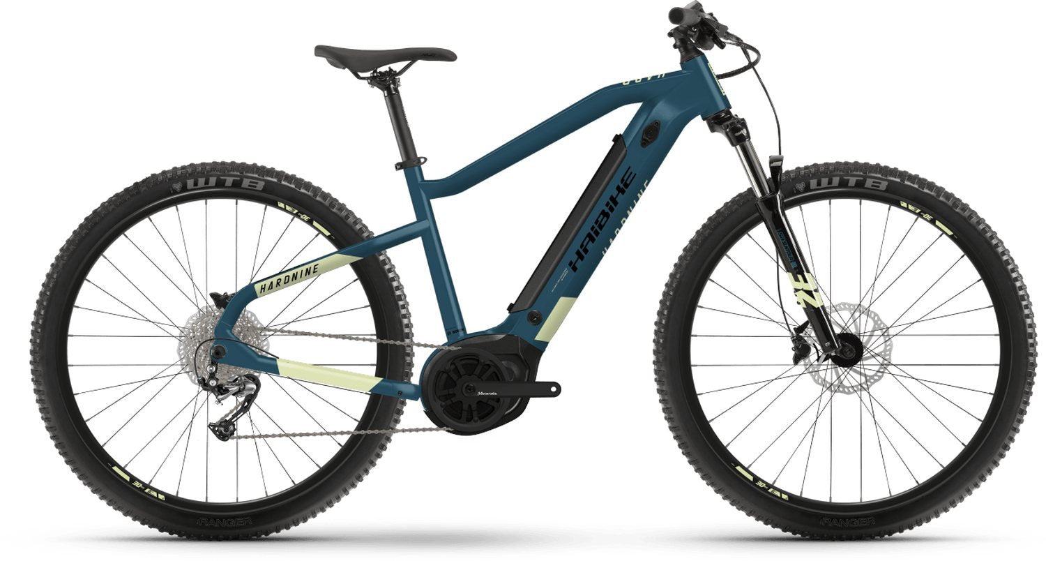 Haibike Hardnine E-Mountainbike, blaues Modell mit dicken Reifen, ideal für Offroad-Abenteuer und sportliche Fahrer.