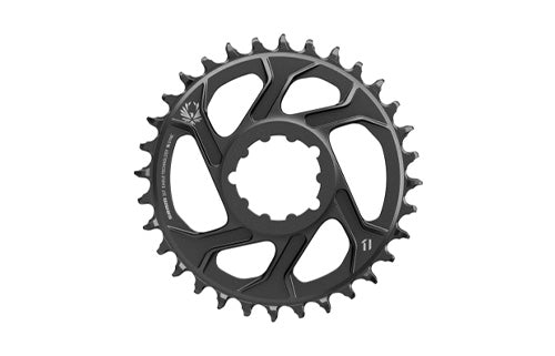 Schwarzes Fahrradkettenblatt mit 32 Zähnen, geeignet für Mountainbikes, mit dekorativem Muster auf der linken Seite.