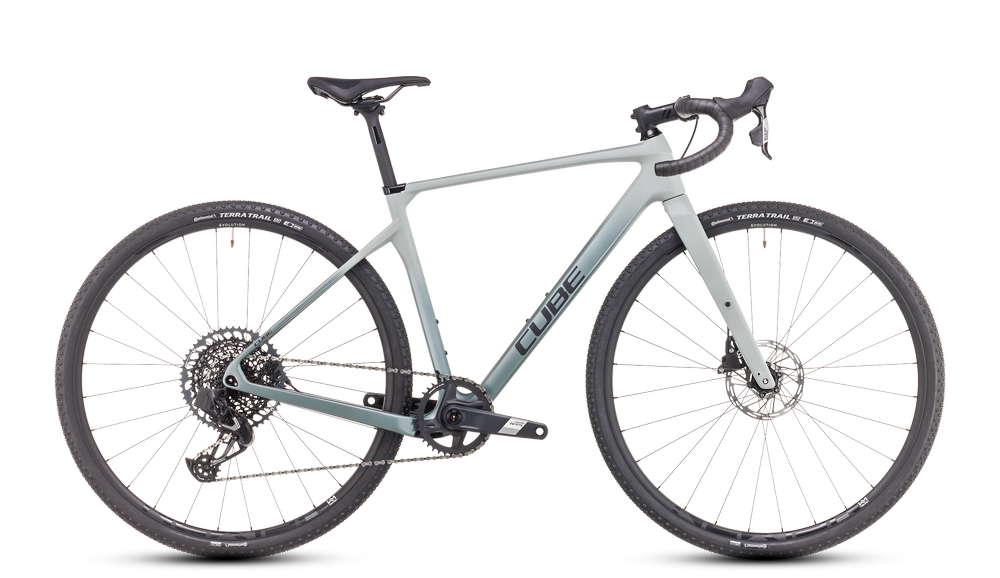 Cube Nuroad Fahrrad in Grau für Gelände- und Straßenfahrten, mit robustem Rahmen und breiten Reifen.